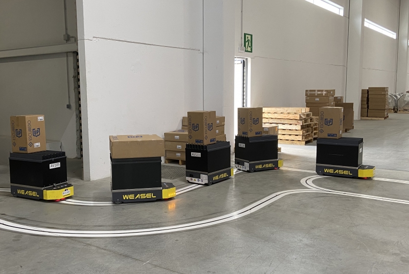 Escubedo’s factory and warehouse connected with SSI Schaefer's Weasel® robots